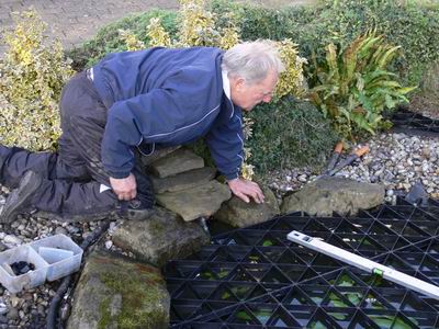 One of our professional fitters adding the finishing touches to an installation